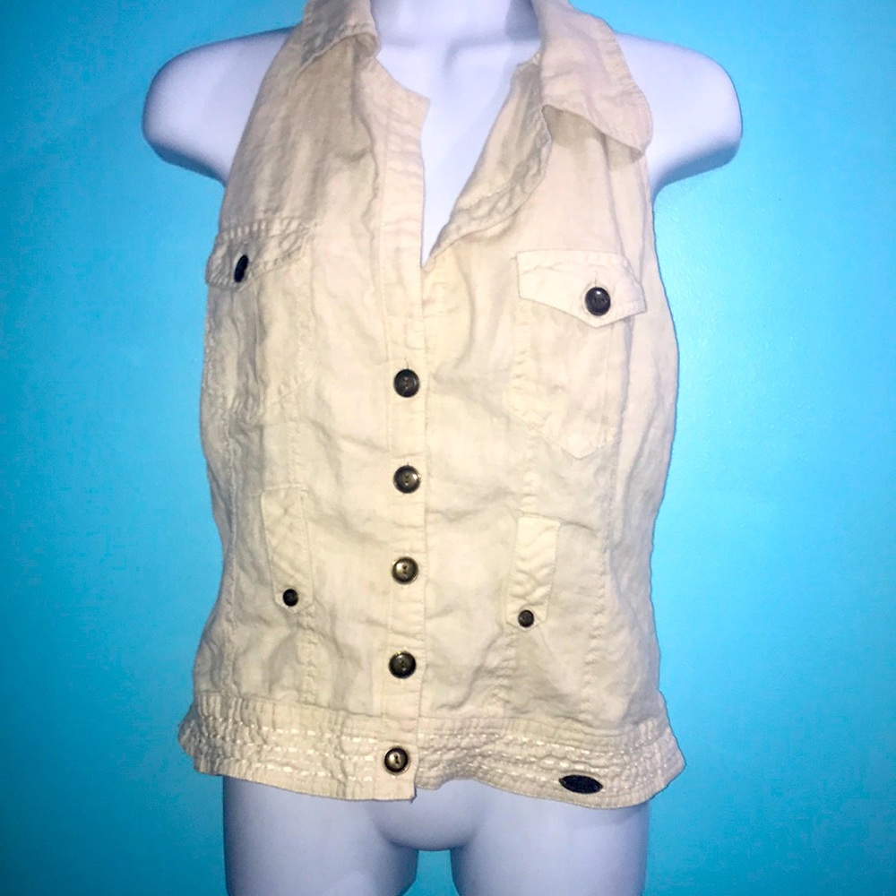 Cream color vest type of shirt